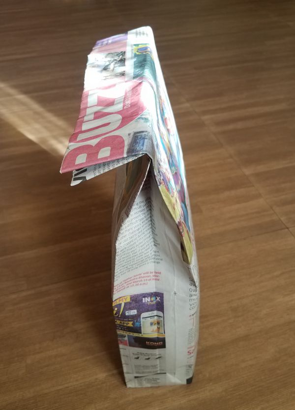 The prisoners make these bags with newspaper for Bharati's Tuk Tuk shop as shopping bags. This is one of her cherities